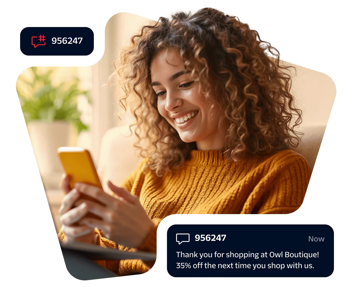 Woman Receiving Discount Notification on Smartphone Smiling woman looking at smartphone with discount notification popup on screen.