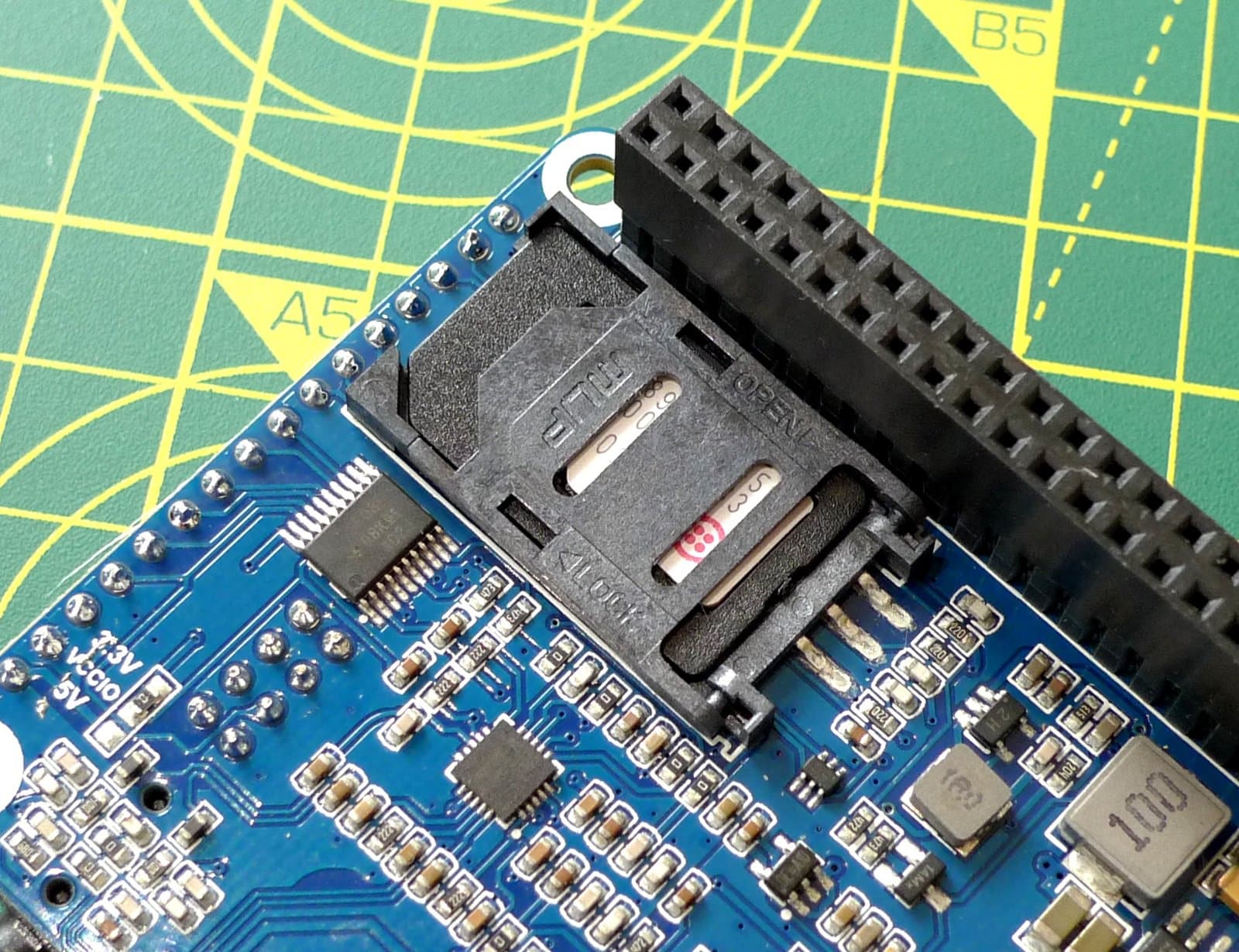 Lock the SIM retainer in place to keep the Twilio SIM secure.