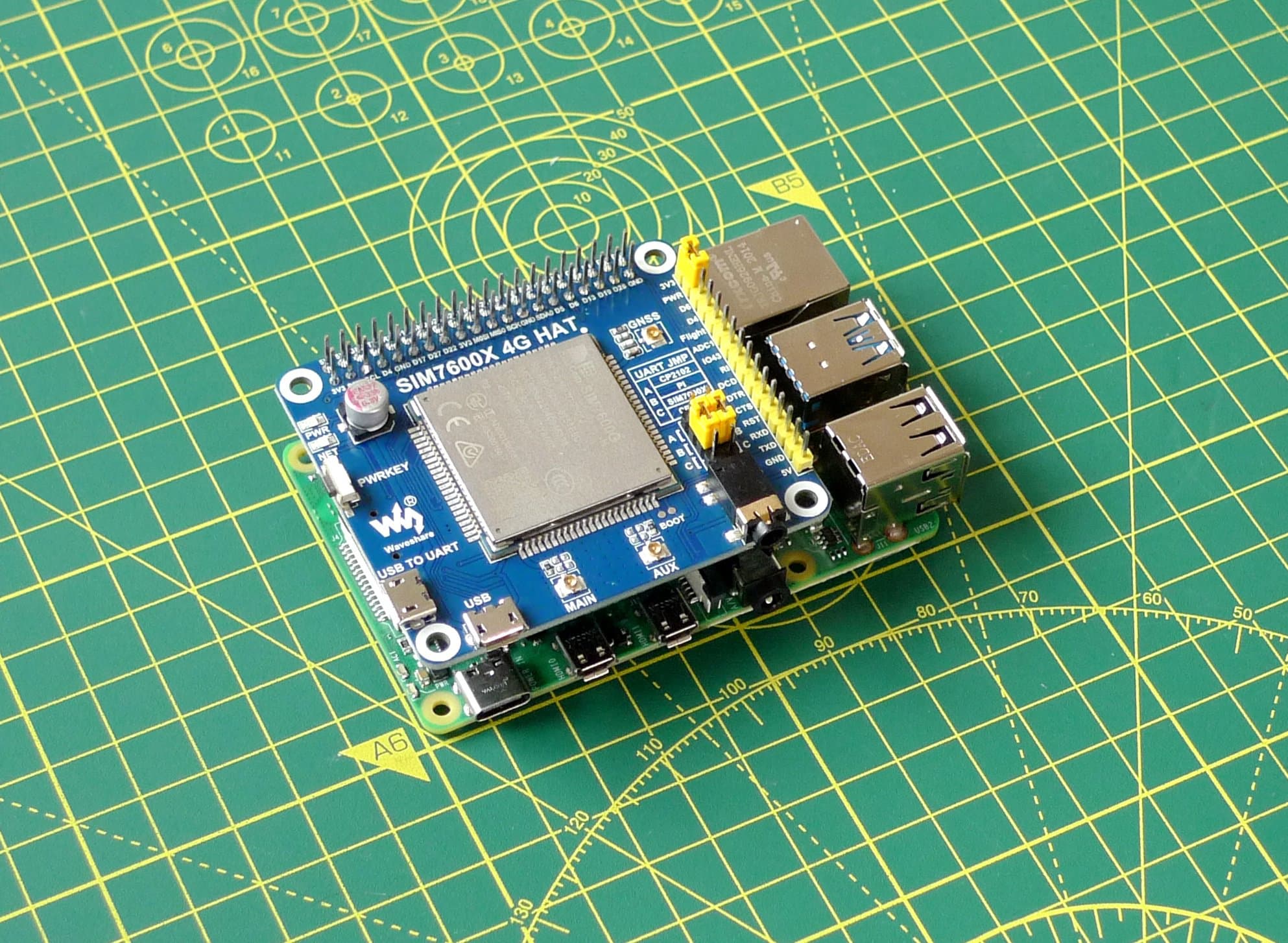 Fit the Hat onto the Pi GPIO pins.