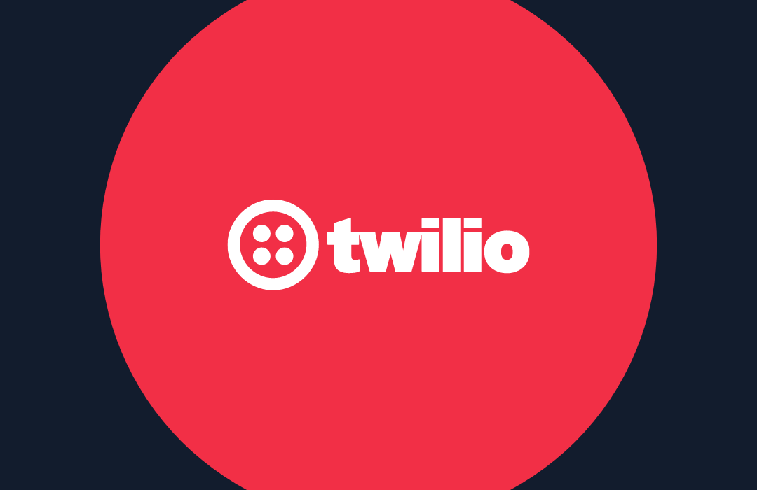 Twilio logo in white on a red circle with a dark blue background.