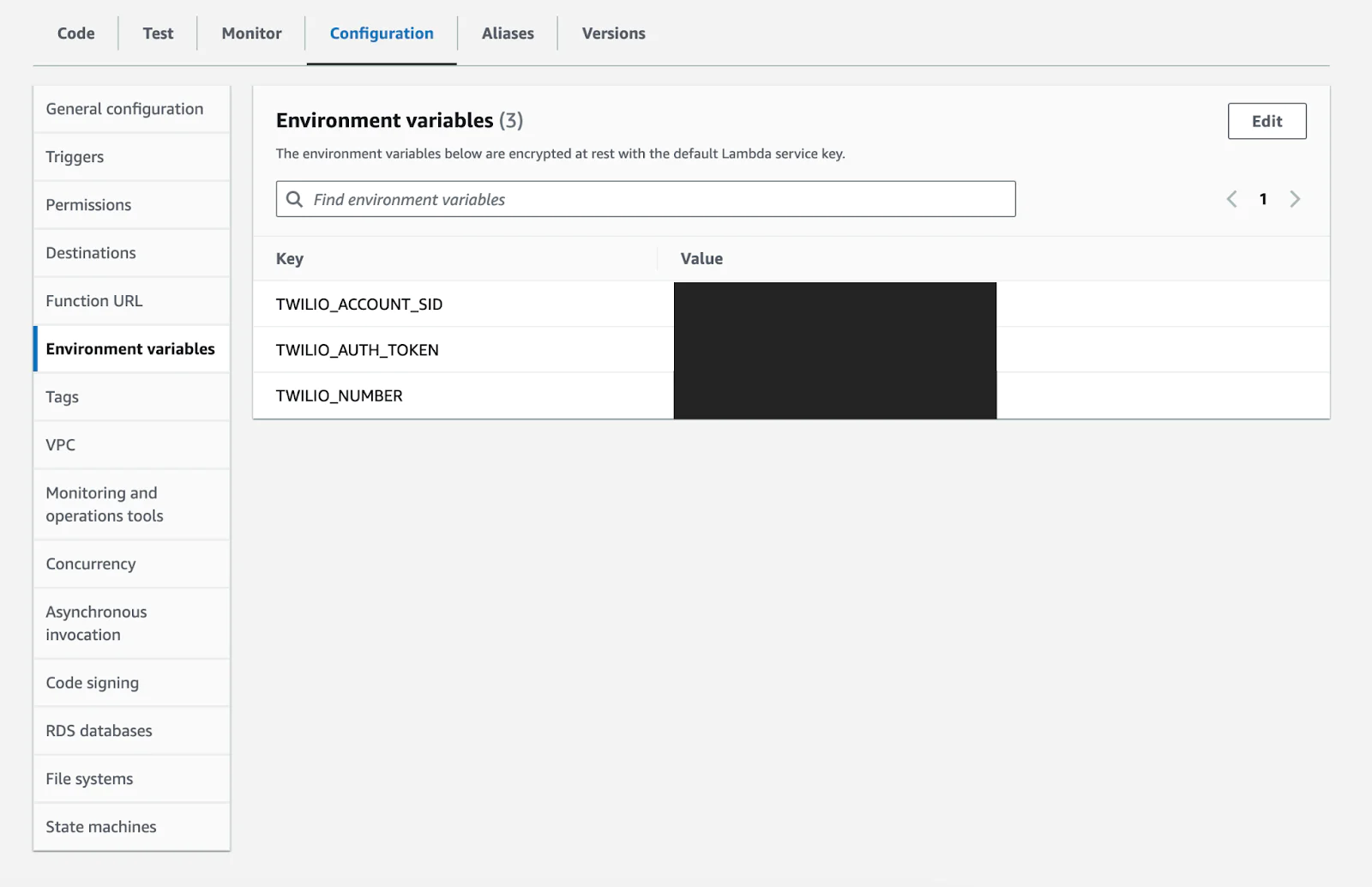 Configuration tab in Lambda Function, with Environment Variables setting selected. Added Twilio secrets in Environment Variables.