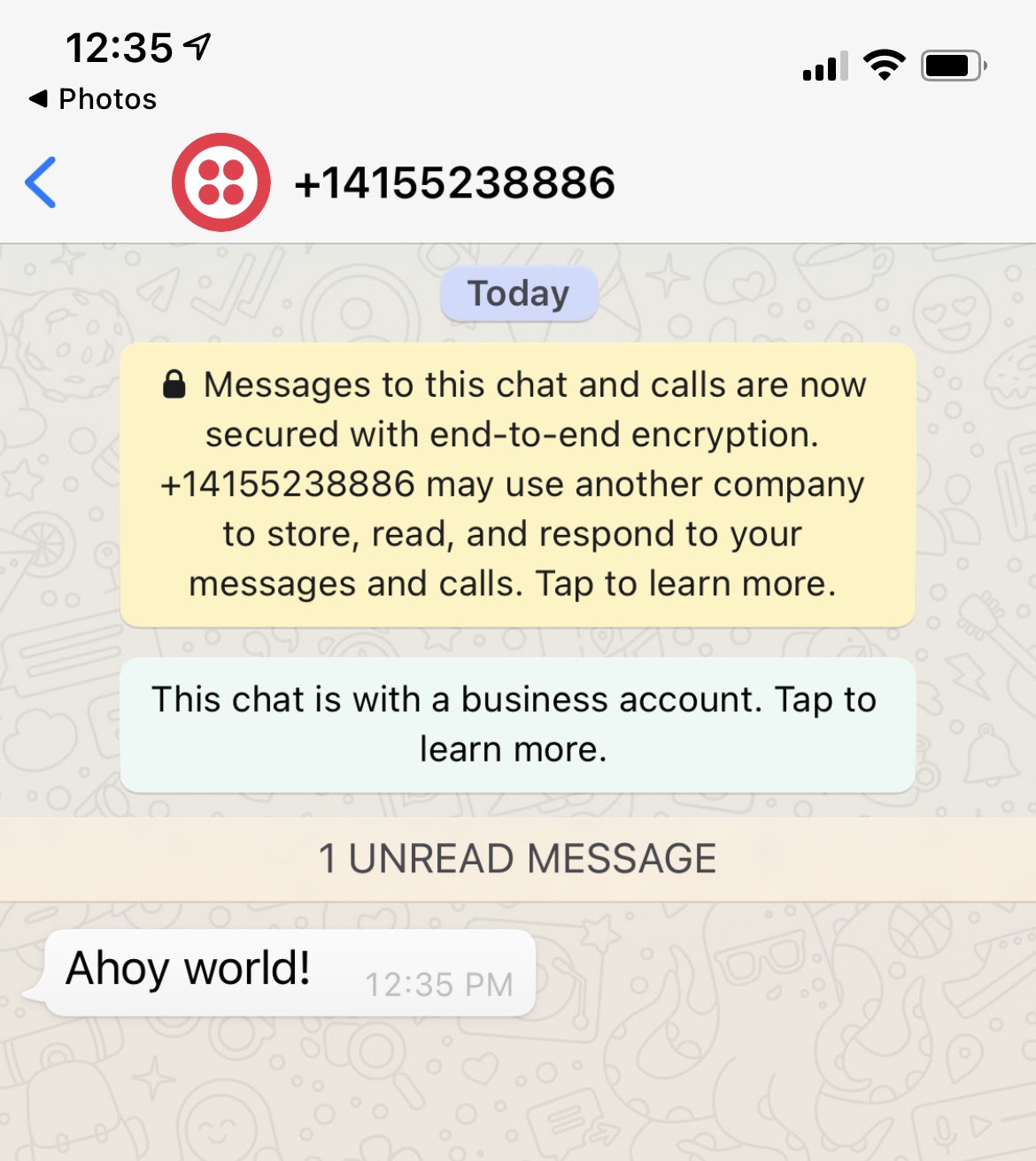 Screenshot of WhatsApp showing message that says Ahoy World