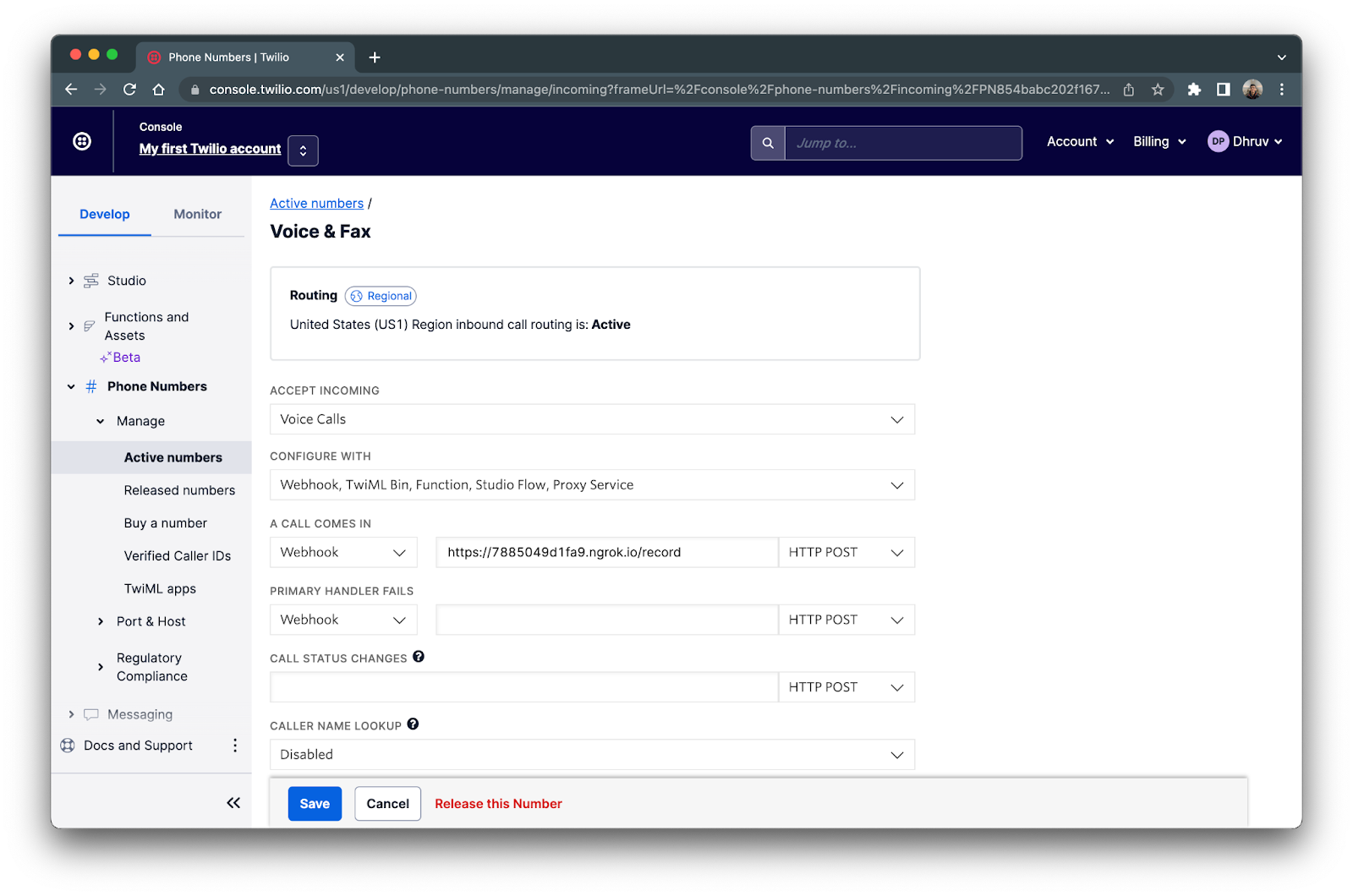 Twilio phone number settings in Twilio console with ngrok forwarding URL within the webhook textbox