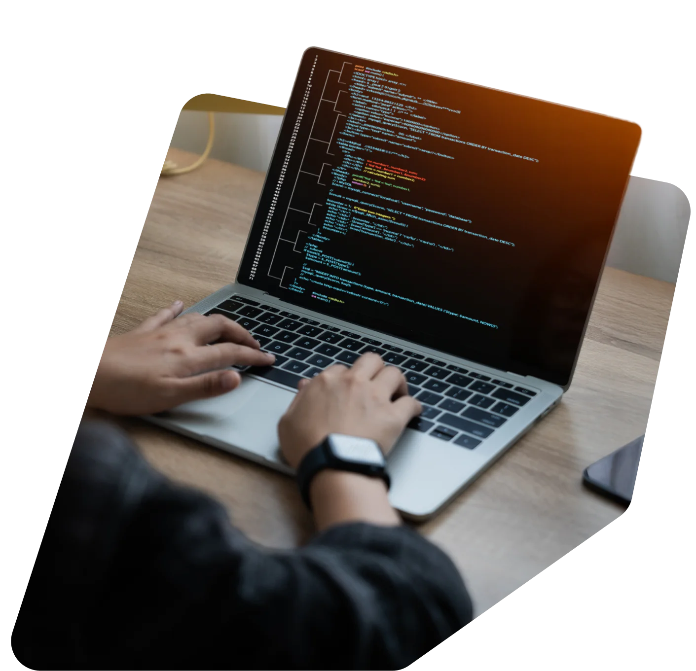 Brands providing customer engagement Coding Computer Programmer, A woman sits at a table with a computer monitor and laptop in front of her. She was typing on the keyboard and looking at the computer screen.