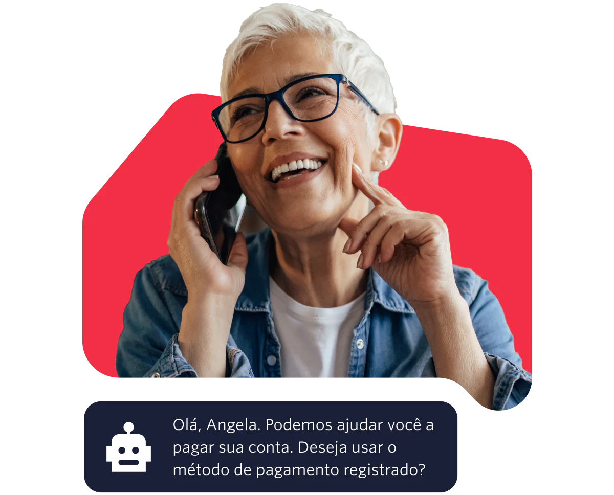 Elderly woman with glasses smiling while talking on the phone against a red background. Elderly woman with glasses smiling while talking on the phone against a red background.
